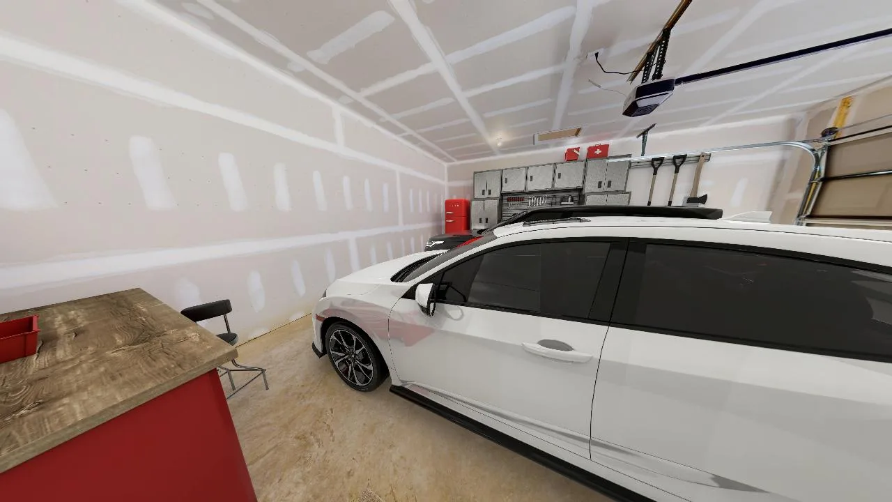 A white car is parked inside a clean, unfinished garage with a wooden workbench, black chair, wall cabinets, toolboxes, and a partially open garage door.