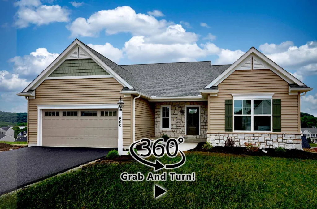 Single-story American suburban house with beige siding, a two-car garage, green shutters, and manicured lawn in Summergrove. A 360° Grab And Turn! icon is overlaid in front, indicating a virtual tour feature.
