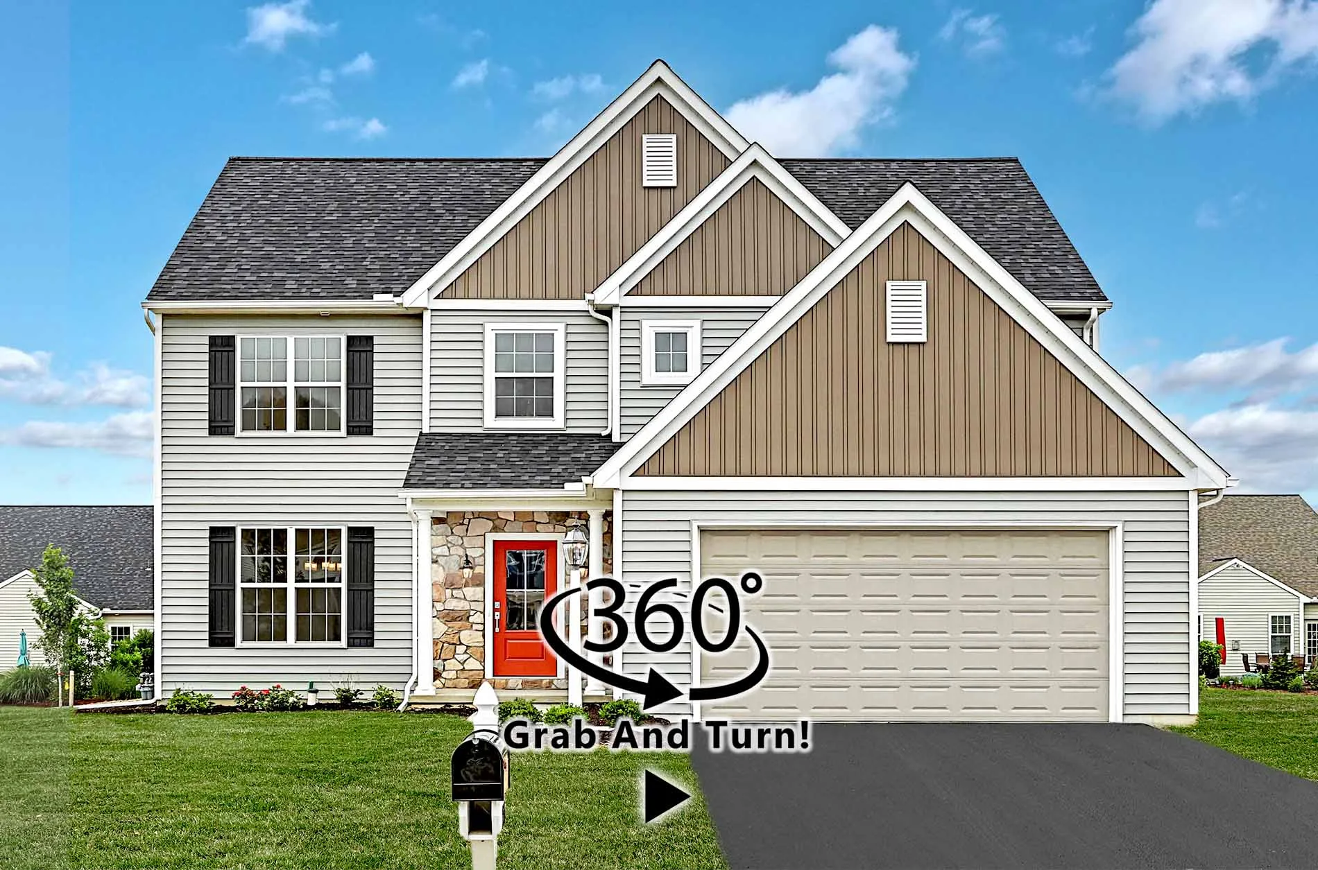 A two-story suburban house with beige siding, stone accents, black shutters, a red front door, and a double garage. A mailbox is in front, with a 360° Grab And Turn! overlay at the center.